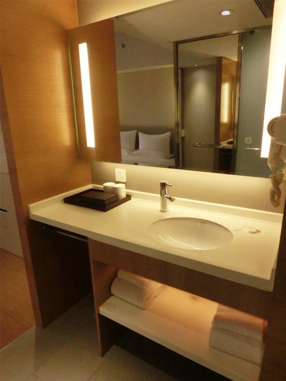 Ji Hotel Guangzhou Zhujiang New Town Номер фото